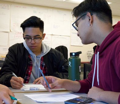 Students working on math assignment