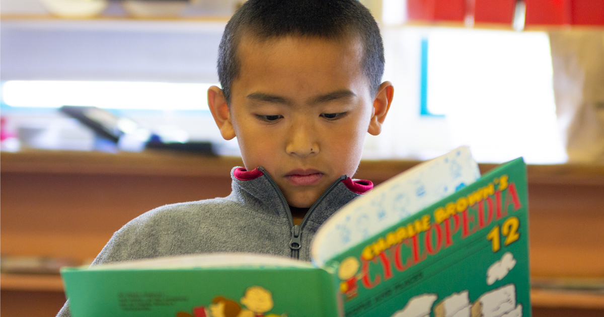 Photo of kid reading