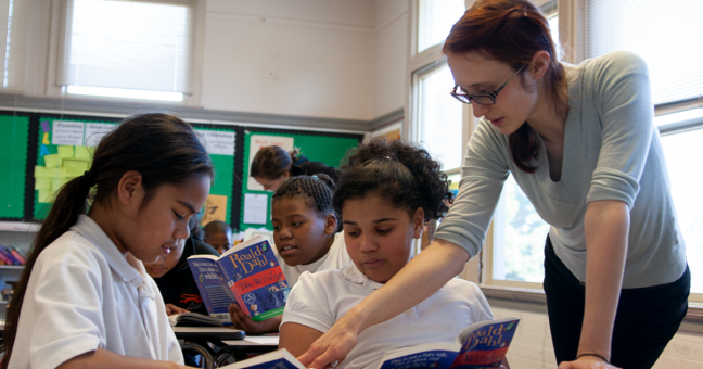 Teacher with students