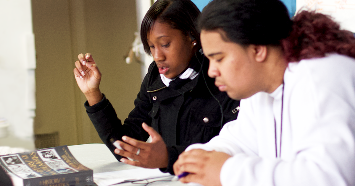 Students focusing on school work