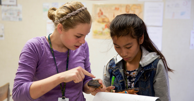 Two students in a classroom