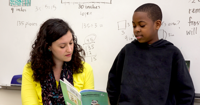 Teacher and student in class